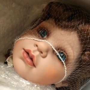 Mint condition porcelain dolls